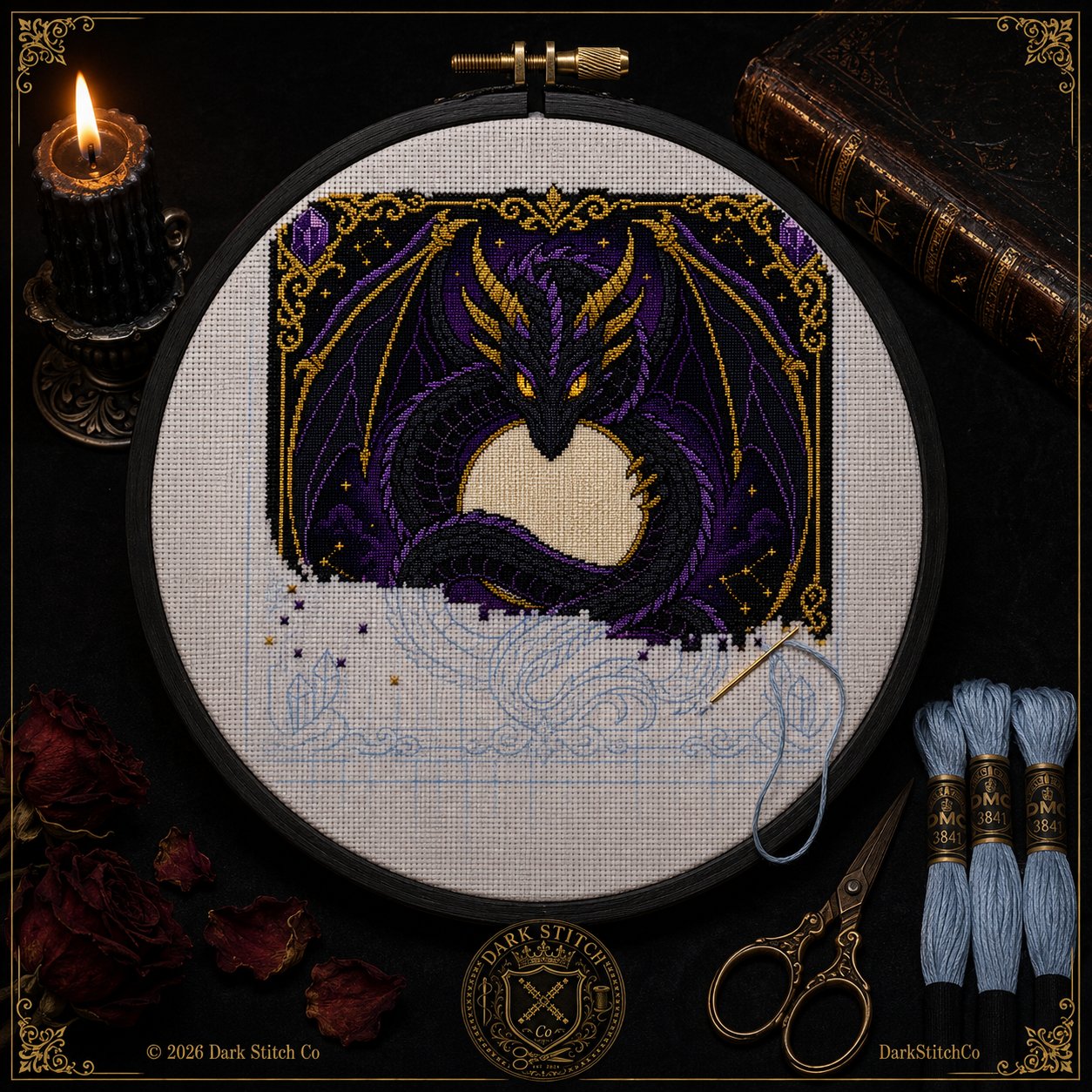 Shadow Dragon Moon cross stitch hoop displayed in witchy gothic home decor aesthetic